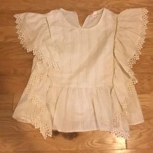 White and gold shirt